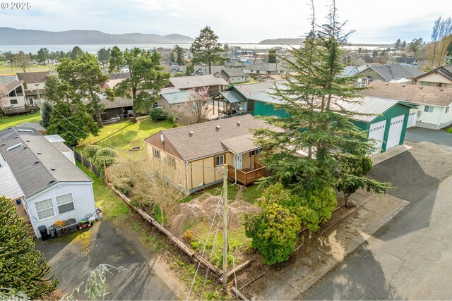 drone / aerial view with a mountain view and a residential view