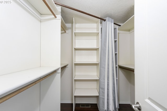 7134 SW 184th Pl, Beaverton, OR 97007 - spacious closet featuring dark wood-style floors
