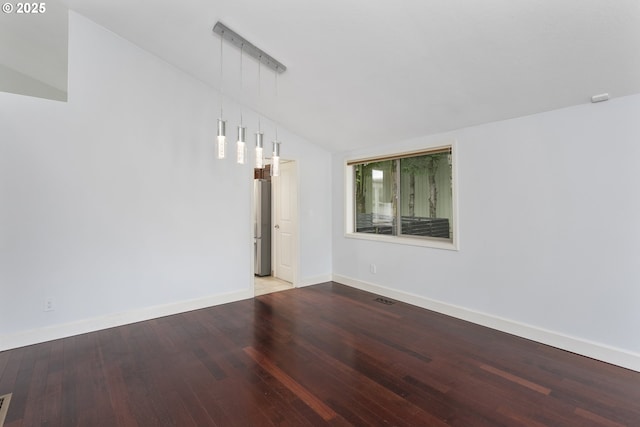 7134 SW 184th Pl, Beaverton, OR 97007 - spare room with wood finished floors and lofted ceiling