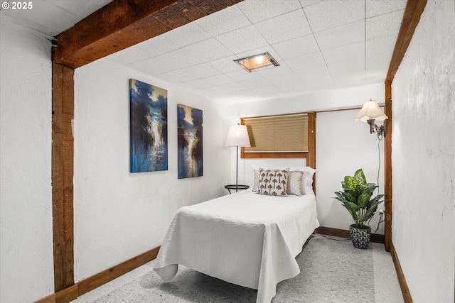 bedroom featuring baseboards