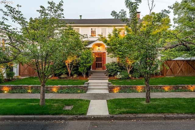 4108 NE 30th Ave Unit A & B, Portland, OR 97211 - view of property hidden behind natural elements featuring a chimney