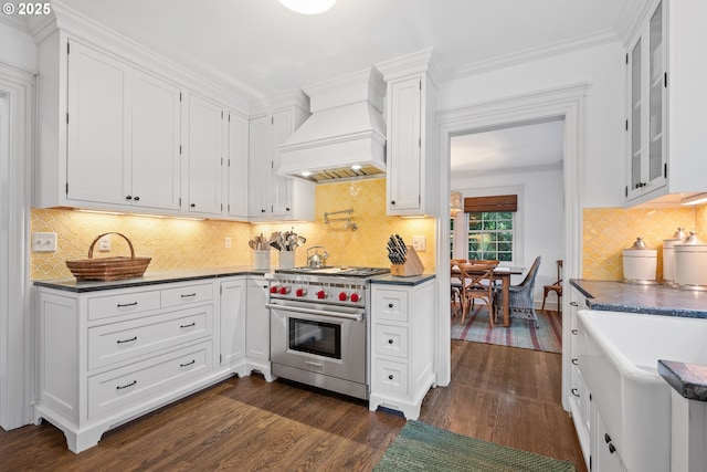 4108 NE 30th Ave Unit A & B, Portland, OR 97211 - kitchen featuring luxury stove, custom range hood, white cabinetry, dark wood-style floors, and glass insert cabinets
