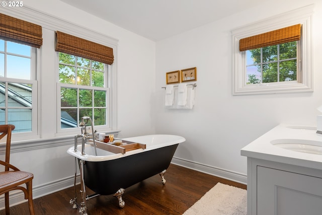 4108 NE 30th Ave Unit A & B, Portland, OR 97211 - office area featuring dark wood-style flooring, a sink, and baseboards