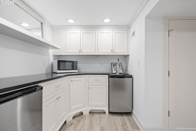 4108 NE 30th Ave Unit A & B, Portland, OR 97211 - kitchen featuring refrigerator, stainless steel dishwasher, white cabinets, dark countertops, and recessed lighting