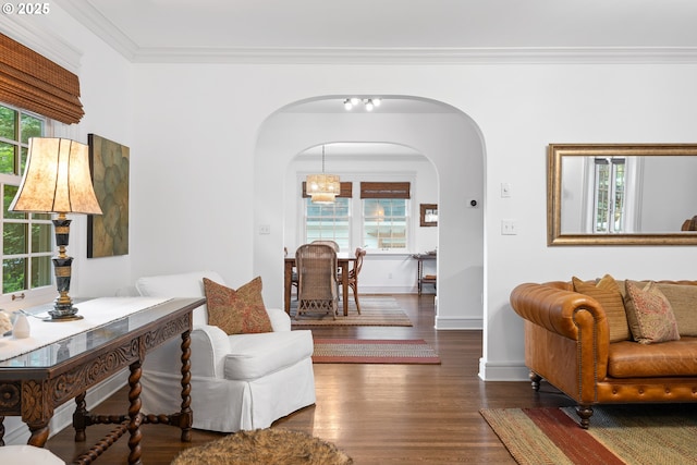 4108 NE 30th Ave Unit A & B, Portland, OR 97211 - living area featuring arched walkways, wood finished floors, crown molding, and baseboards