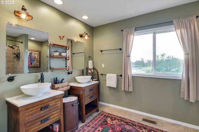 19905 SE Neck Rd, Dayton, OR 97114 - bathroom with two vanities, tile patterned flooring, a shower, and recessed lighting