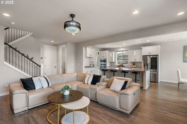 17085 SE Troge Rd, Happy Valley, OR 97086 - living room featuring dark wood-style floors, stairway, and recessed lighting