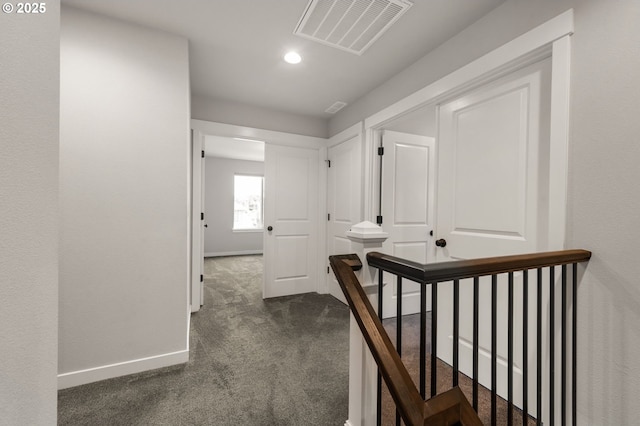 17085 SE Troge Rd, Happy Valley, OR 97086 - hall with an upstairs landing, dark colored carpet, and recessed lighting