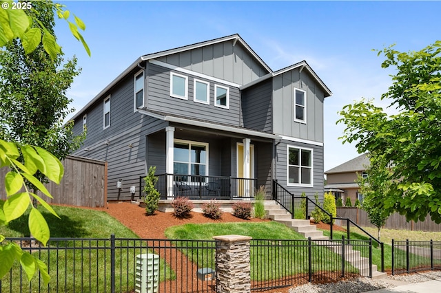17085 SE Troge Rd, Happy Valley, OR 97086 - contemporary home featuring covered porch, board and batten siding, and a fenced front yard