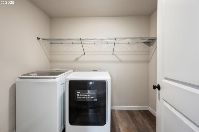 17085 SE Troge Rd, Happy Valley, OR 97086 - washroom featuring washer and dryer and dark wood finished floors
