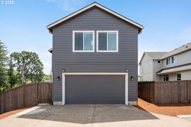 17085 SE Troge Rd, Happy Valley, OR 97086 - view of front facade with driveway and an attached garage