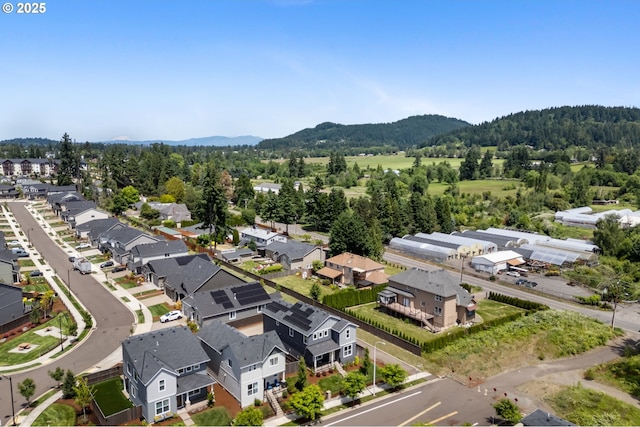17085 SE Troge Rd, Happy Valley, OR 97086 - aerial view of residential area featuring mountains and a heavily wooded area