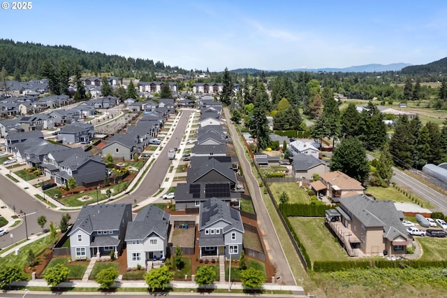 17085 SE Troge Rd, Happy Valley, OR 97086 - aerial perspective of suburban area featuring a mountainous background and a forest