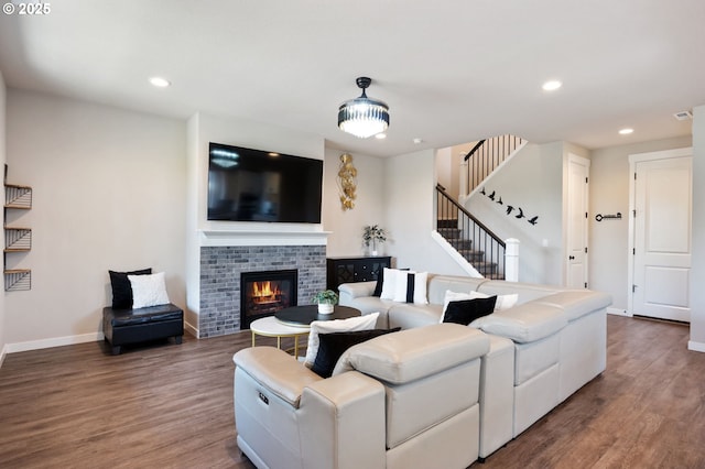 17085 SE Troge Rd, Happy Valley, OR 97086 - living area with recessed lighting, stairs, wood finished floors, and a fireplace