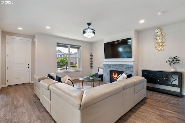 17085 SE Troge Rd, Happy Valley, OR 97086 - living room with a fireplace, recessed lighting, and wood finished floors
