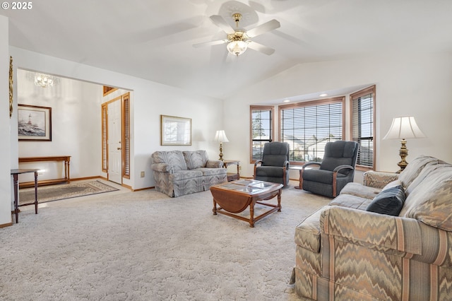 carpeted living room featuring vaulted ceiling and ceiling fan