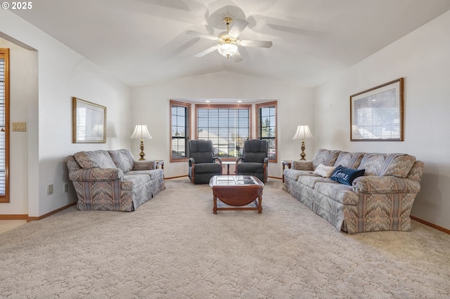 living room featuring lofted ceiling, light colored carpet, and ceiling fan