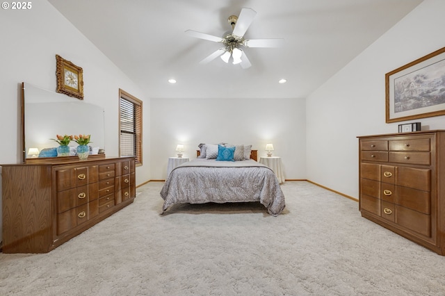 carpeted bedroom with lofted ceiling and ceiling fan