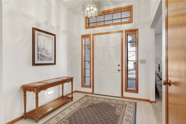 entrance foyer with an inviting chandelier