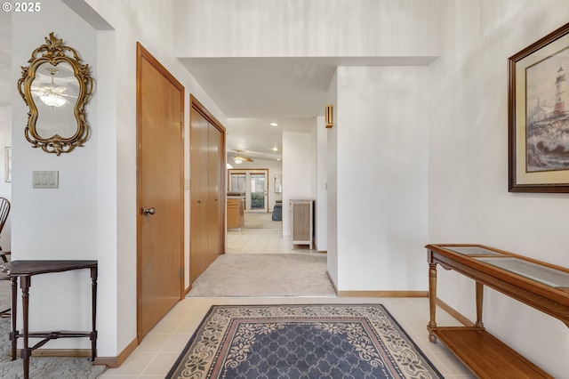 hallway with light tile patterned floors