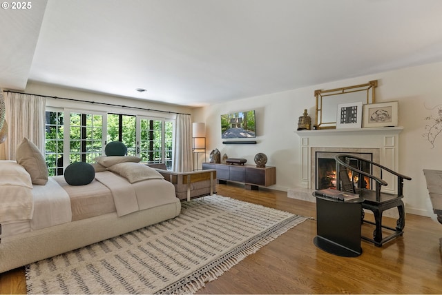 2917 Westview Cir, Lake Oswego, OR 97034 - bedroom with a premium fireplace, wood finished floors, and baseboards