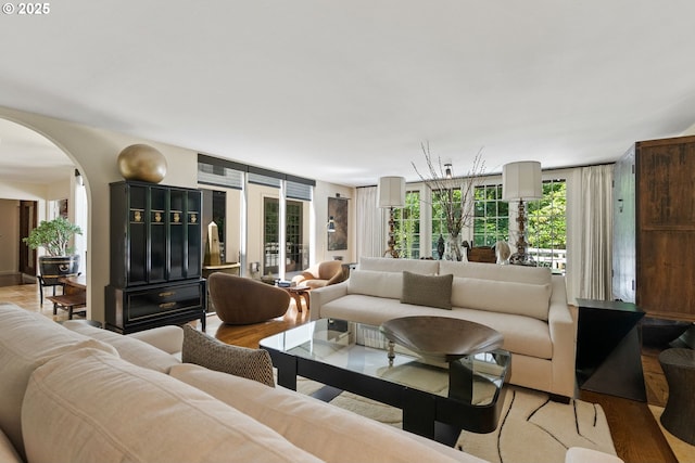 2917 Westview Cir, Lake Oswego, OR 97034 - living room with arched walkways and light wood-type flooring