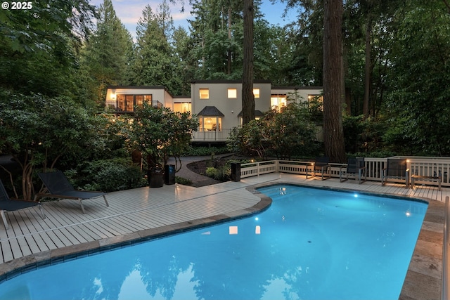 2917 Westview Cir, Lake Oswego, OR 97034 - pool at dusk featuring an outdoor pool and a deck