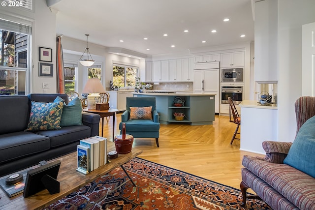 living room with light hardwood / wood-style floors