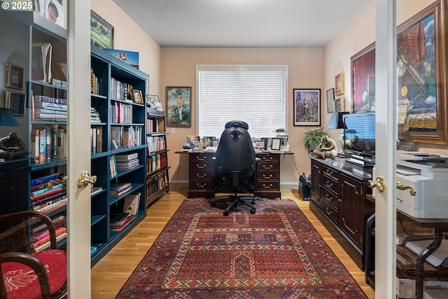 office space featuring light wood-type flooring