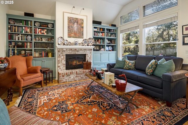 living room with a fireplace and vaulted ceiling