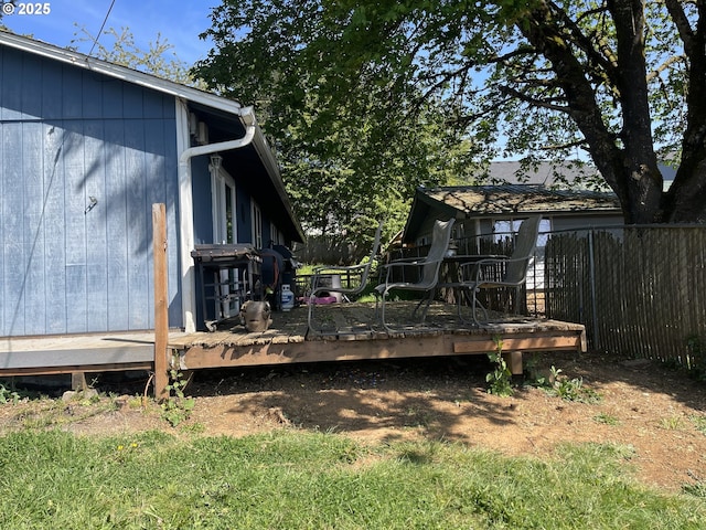 414 NW 5th St, Willamina, OR 97396 - view of yard featuring a wooden deck and fence