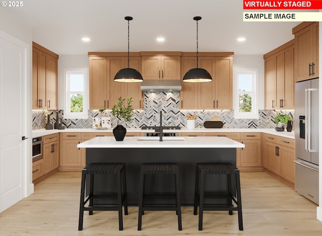6511 NW Olympic Ln Unit L 61, Camas, WA 98607 - kitchen featuring appliances with stainless steel finishes, healthy amount of natural light, light countertops, decorative backsplash, and recessed lighting