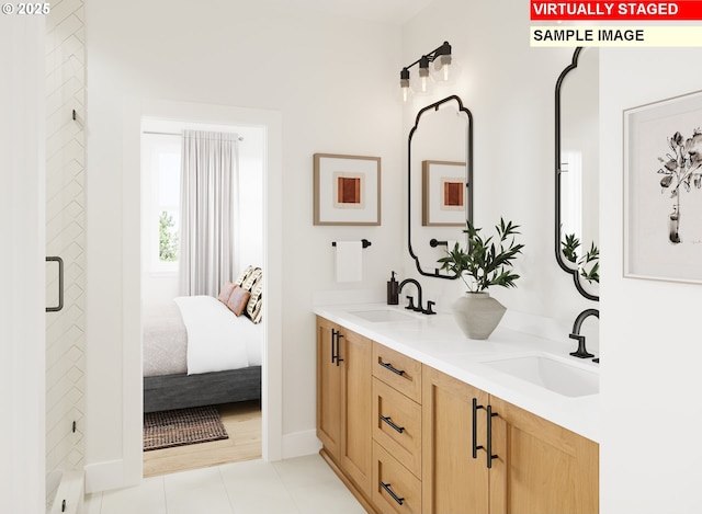 6511 NW Olympic Ln Unit L 61, Camas, WA 98607 - full bath featuring double vanity, baseboards, ensuite bath, and tile patterned flooring