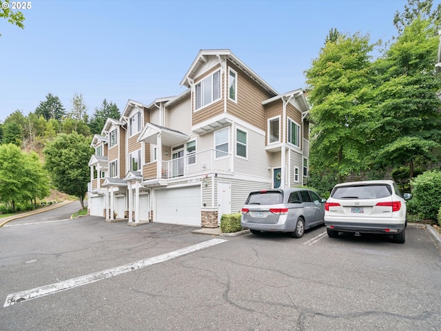 8710 SW 147th Ter Unit 104, Beaverton, OR 97007 - view of front facade featuring a garage