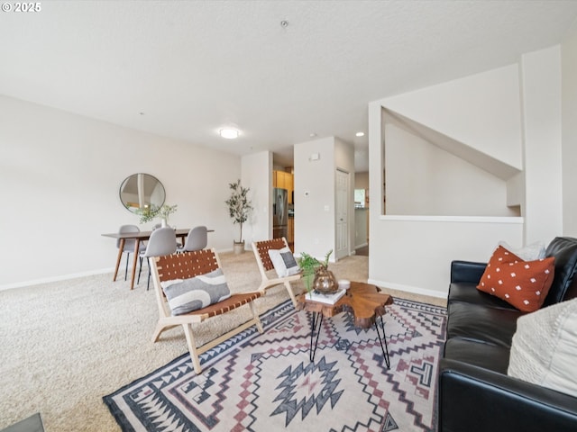 8710 SW 147th Ter Unit 104, Beaverton, OR 97007 - carpeted living room with baseboards