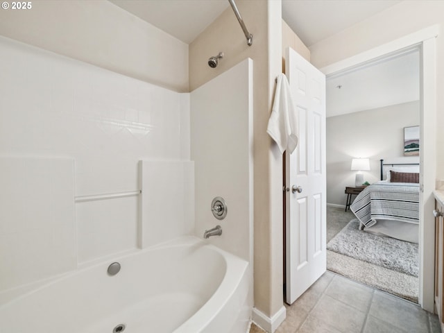8710 SW 147th Ter Unit 104, Beaverton, OR 97007 - ensuite bathroom featuring bathtub / shower combination, tile patterned floors, and vanity