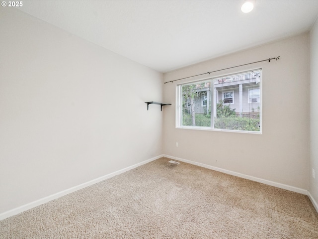 8710 SW 147th Ter Unit 104, Beaverton, OR 97007 - carpeted empty room featuring baseboards