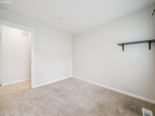 8710 SW 147th Ter Unit 104, Beaverton, OR 97007 - spare room with carpet and baseboards