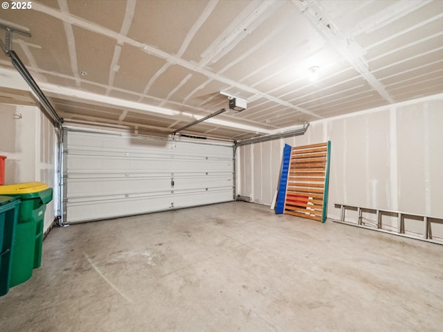 8710 SW 147th Ter Unit 104, Beaverton, OR 97007 - garage featuring a garage door opener
