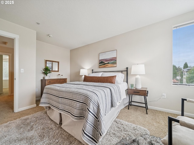 8710 SW 147th Ter Unit 104, Beaverton, OR 97007 - carpeted bedroom with baseboards