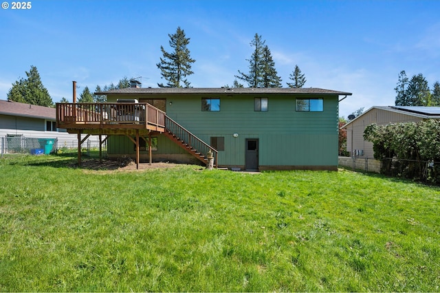 rear view of property with stairs and a deck