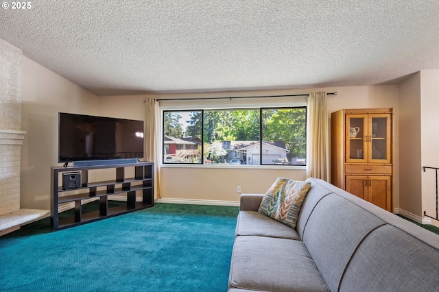 living area featuring carpet floors, a textured ceiling, and baseboards