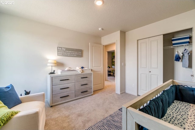 2969 U St, Springfield, OR 97477 - bedroom featuring light colored carpet, a textured ceiling, a closet, and baseboards