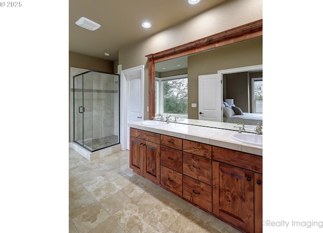 bathroom featuring vanity and walk in shower