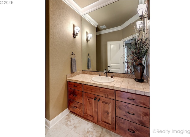 bathroom featuring vanity and crown molding