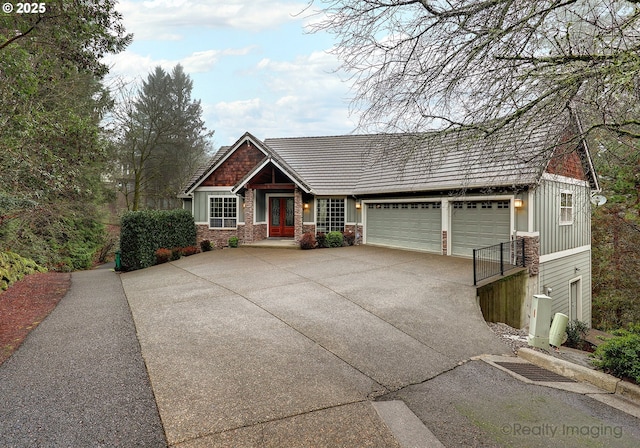 view of front of home with a garage