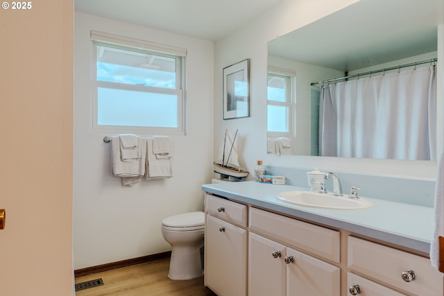 12520 SW Prince Albert St, King City, OR 97224 - full bathroom with wood finished floors and vanity