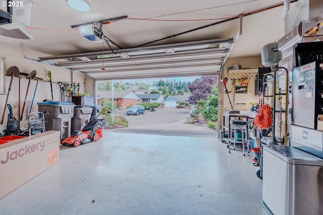 12520 SW Prince Albert St, King City, OR 97224 - garage featuring a garage door opener