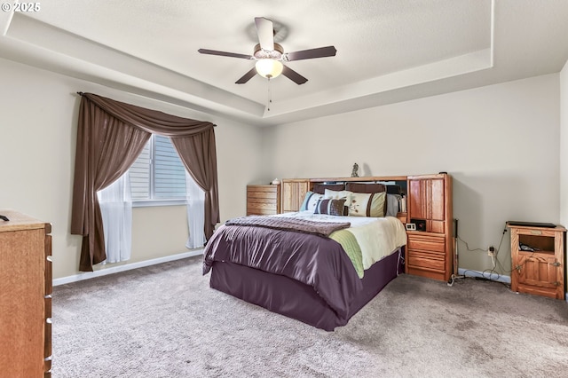 2741 25th Pl, Forest Grove, OR 97116 - bedroom with a raised ceiling, carpet flooring, baseboards, and ceiling fan