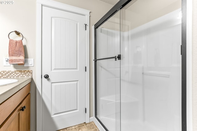 2741 25th Pl, Forest Grove, OR 97116 - full bathroom with a stall shower, vanity, and decorative backsplash